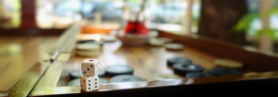 An image of a board game table with dice