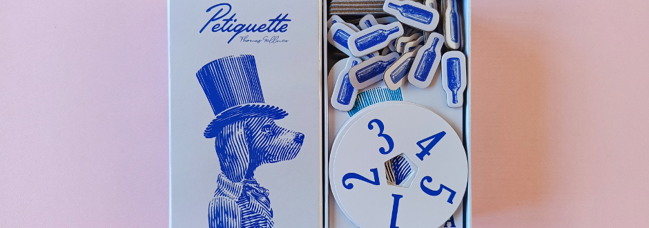 A board game box featuring a blue dog, design the board game box contents with blue components
