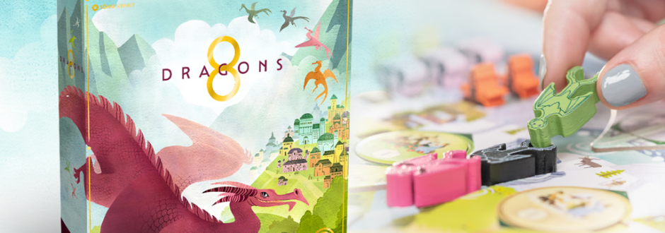Box of "8 Dragons" board game featuring colorful dragons flying over a whimsical landscape. Close-up of a hand placing a green dragon piece on the game board.