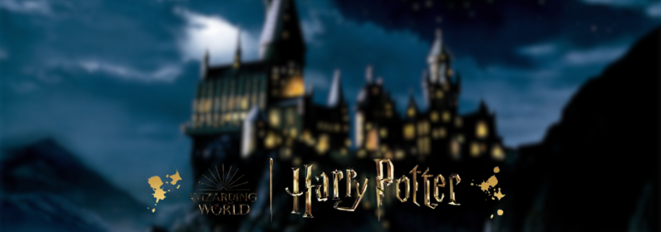Dark, atmospheric image of Hogwarts castle at night with the Wizarding World and Harry Potter logos in gold lettering.