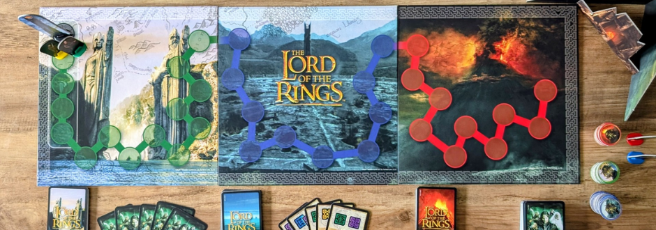 Lord Of The Rings Mount Doom board game box and components on a wooden table