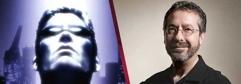 A photo of a video game character next to Warren Spector