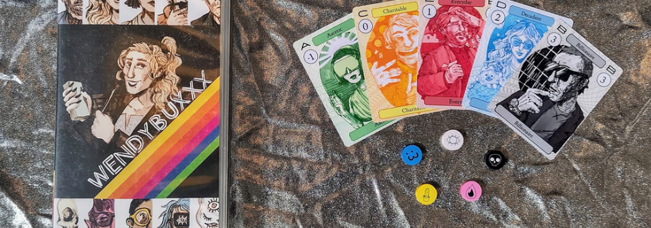 A rainbow-striped WENDYBUXXX box on the left, with colourful character cards fanned out on the right and small tokens below.