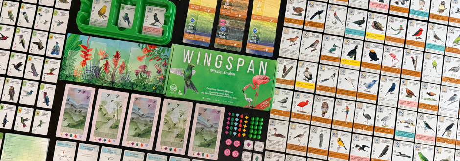 Wingspan Americas box surrounded by cards