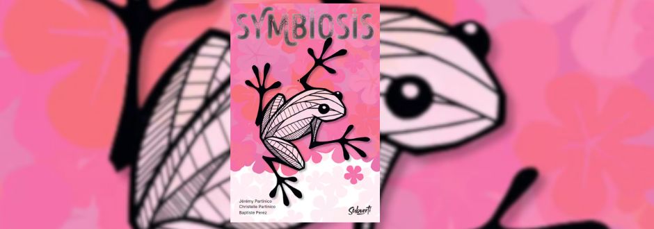 Board game titled "Symbiosis" features a stylized frog with geometric patterns on a pink floral background. The mood is whimsical and artistic