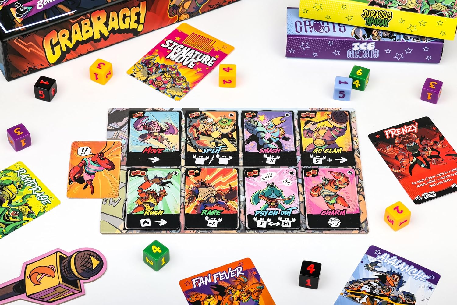 A tabletop arrangement of the board game Grabrage!, showing the game box, cards, dice, and game board on a white background.
